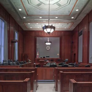 Empty courtroom, symbolizing the formal setting where arraignments take place