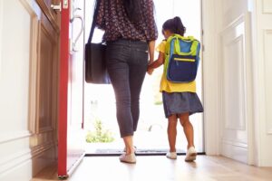 Parent and child wearing backpacks, heading to school, symbolizing the importance of meeting special education deadlines to ensure appropriate services and support